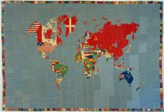 Rectangular map of the world with flags embroidered on their respective countries and a border of letters and numbers.